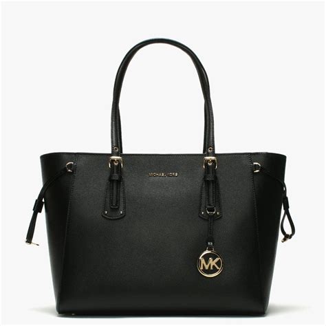 michael kors tote bag black|michael kors black leather bag.